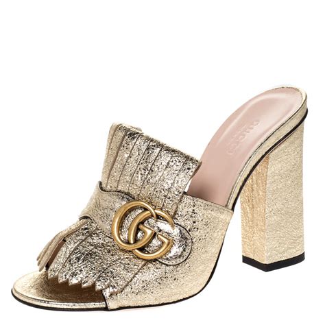 gucci metallic gold mules|Gucci velvet mules with fur.